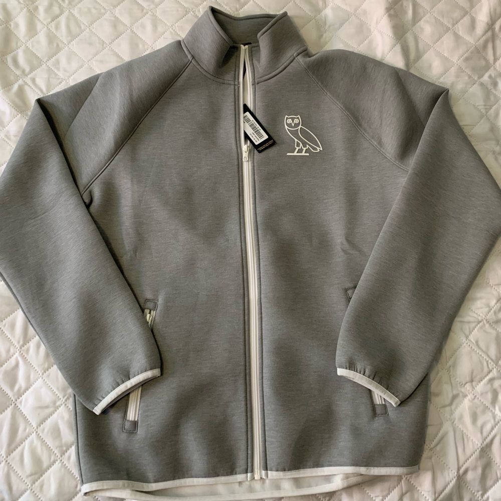 October’s Very Own Zip-Up track turtle neck